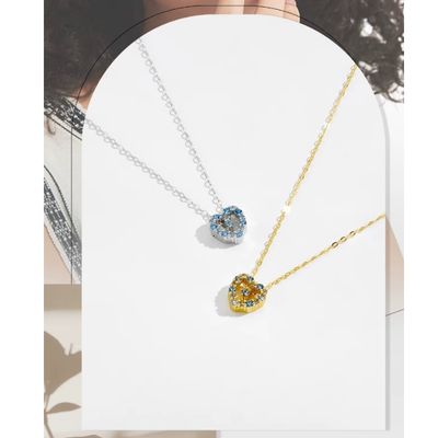 Halskette mit blauem Stein in Herzform Ringsilber