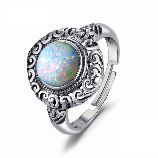 Blue shimmering opal silver ring